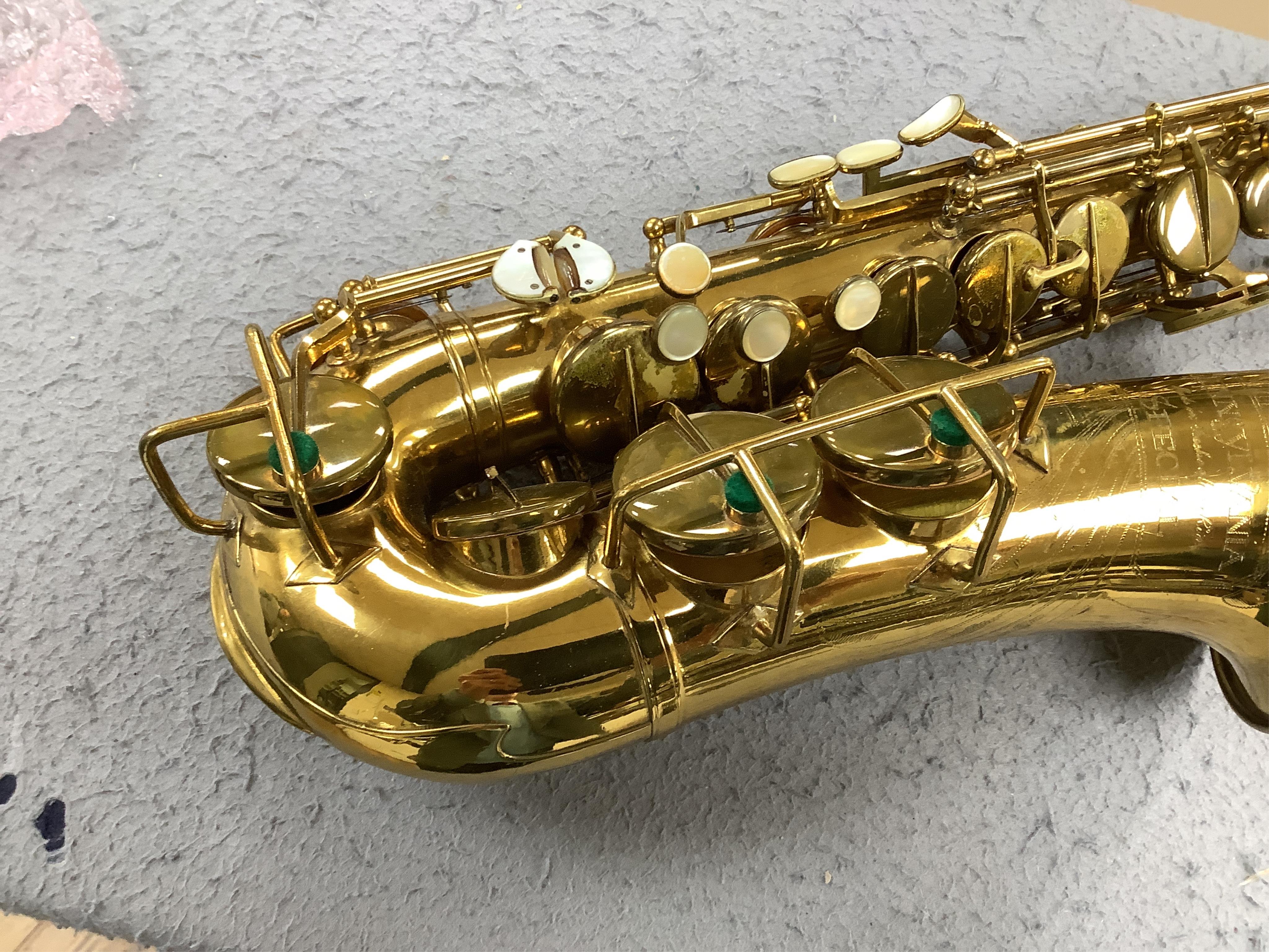 A cased Pennsylvania Special alto saxophone (pads are understood to have been replaced). Condition - fair to good.